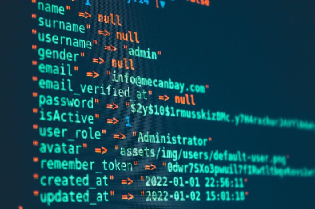Vibrant close-up of code displayed on a monitor with various programming details.